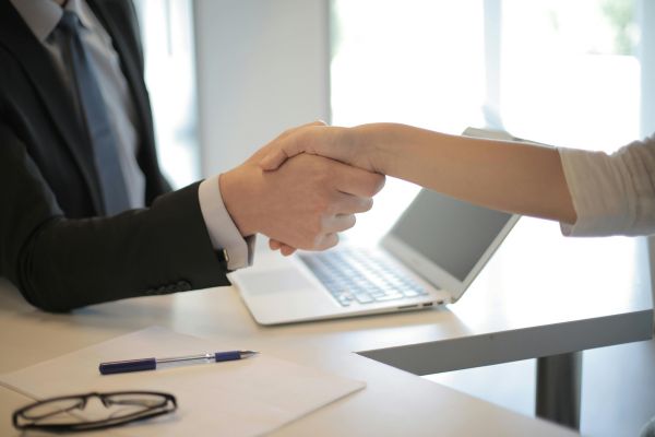 Handshake in business meeting